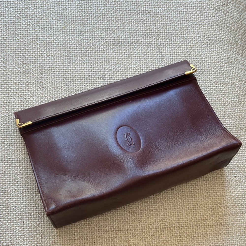 Cartier vintage Women’s Burgundy Leather Fold-Over Clutch with Gold Accent